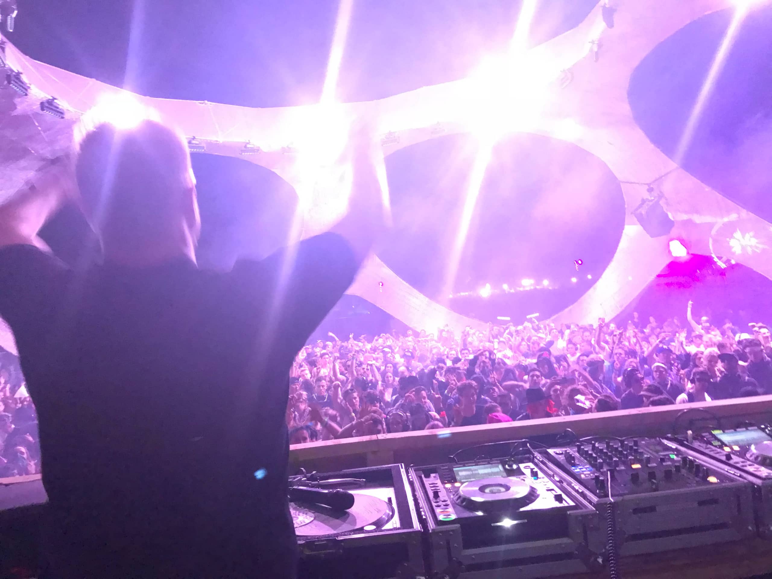 View from the booth across a packed crowd under the Coachella Dome stage canopy